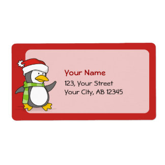 Christmas penguin walking on snow label
