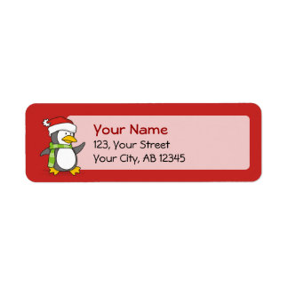 Christmas penguin walking on snow label