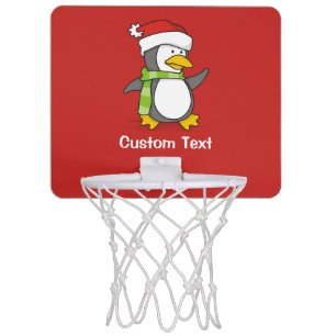 Christmas penguin walking on snow mini basketball hoop