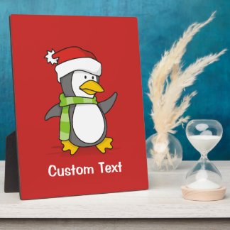 Christmas penguin walking on snow plaque