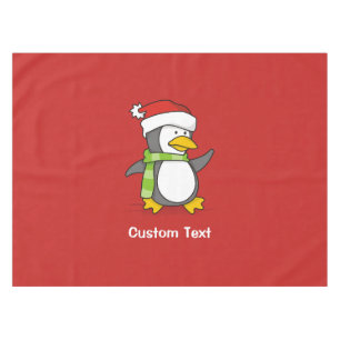 Christmas penguin walking on snow tablecloth