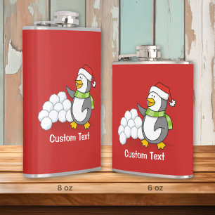 Christmas penguin with snow balls waving hip flask