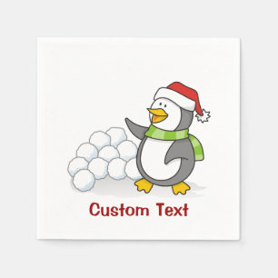 Christmas penguin with snow balls waving paper napkins