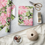 Christmas Pink Poinsettia Floral Holiday Wrapping Paper<br><div class="desc">Large pink poinsettias,  winter flowers,  pine branches and holly leaves on black holiday Christmas wrapping paper is fun for gift giving. MATCHING items in our store.</div>