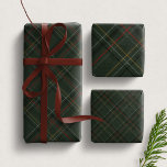 Christmas plaid dark elegant hunter green holiday wrapping paper sheets<br><div class="desc">This trio of classic hunter green holiday plaid makes the perfect festive touch to all your Christmas presents. This festive dark green plaid with checks of navy, gold and hunter green are on trend with the rich festive plaid look. The three sheets features small medium and large scale holiday tartan...</div>