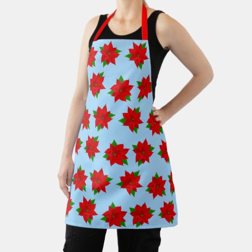 Christmas Poinsettia Flower Pattern on Light Blue Apron