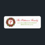 Christmas Poinsettia Wreath Monogram Address Label<br><div class="desc">Pretty wreath of poinsettias,  holly and mistletoe surrounds your monogram and makes a beautiful seal to your holiday envelopes and packages.  Also available:</div>