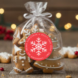 Christmas Red and White Snowflake Winter Holidays Classic Round Sticker<br><div class="desc">A red and white sticker for the holidays greeting card. It has a snowflake in the center and text in the circle around it: above it there is the message Merry Christmas & Happy New Year, under it there is the family name and the year. The background is red, the...</div>