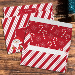 Christmas Red and White Stripes Envelope<br><div class="desc">These cute Christmas envelopes with red and white stripes on the outside . The front has a large space for you to write the mailing name and address and a little Santa for cuteness . The text reads "Special delivery for" , but you can modify it with your own ,...</div>