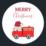 Christmas Red Fire Truck Classic Round Sticker<br><div class="desc">A cute illustration of a red fire truck wearing a Santa hat and decorated in Christmas lights. The adorable red fire engine rushing off to put out a fire. Perfect gift for anyone and any age. An all time favorite emergency vehicle.</div>
