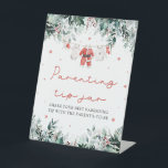Christmas Red Santa Baby Parenting Tip Jar Game Pedestal Sign<br><div class="desc">The Red Santa Gender Neutral Santa Baby Clothes Christmas Santa Baby Shower Parenting Tip Jar Game Sign is a delightful, holiday-inspired addition to your baby shower! Featuring delicate snowflakes, eucalyptus greenery, and adorable Santa-inspired baby clothes, this sign invites guests to contribute their best parenting advice to the “Parenting Tip Jar.”...</div>