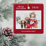Christmas red white family photo elegant ceramic ornament<br><div class="desc">A classic dark red Christmas style background color. The text: Merry Christmas with a white hand lettered style font,  letters.  Template for your own family photo and family name and year inside a slim white frame. 
Perfect as a gift or as a keepsake for your own family.</div>