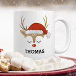 Christmas Reindeer Face Mug<br><div class="desc">A Christmas reindeer face with a Santa hat decorates this mug. Makes a cute Christmas gift for a boy. Personalize this unique mug for a boy you know. Designed for you by Blackberry Boulevard.</div>