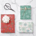 Christmas Retro 50s Snowflakes Pattern 3 Colors Wrapping Paper Sheets<br><div class="desc">This pretty wrapping paper has a retro look with various snowflakes in shades of blue, teal, red and yellow. The background color on the first sheet is red, the second sheet is teal green, and the third sheet is a vintage-looking cream. This wrapping paper is made to match the party...</div>