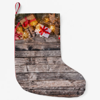 Christmas rustic background, wooden planks. small christmas stocking