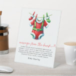 Christmas Santa Baby Shower Message From The Bump Pedestal Sign<br><div class="desc">Celebrate with a personal touch using our Christmas Santa Baby Shower "Message From The Bump" Sign. This charming sign features a festive Santa Claus design set against a rich red background with holly and winter greenery. It’s a delightful way to share a special message from the little one and add...</div>