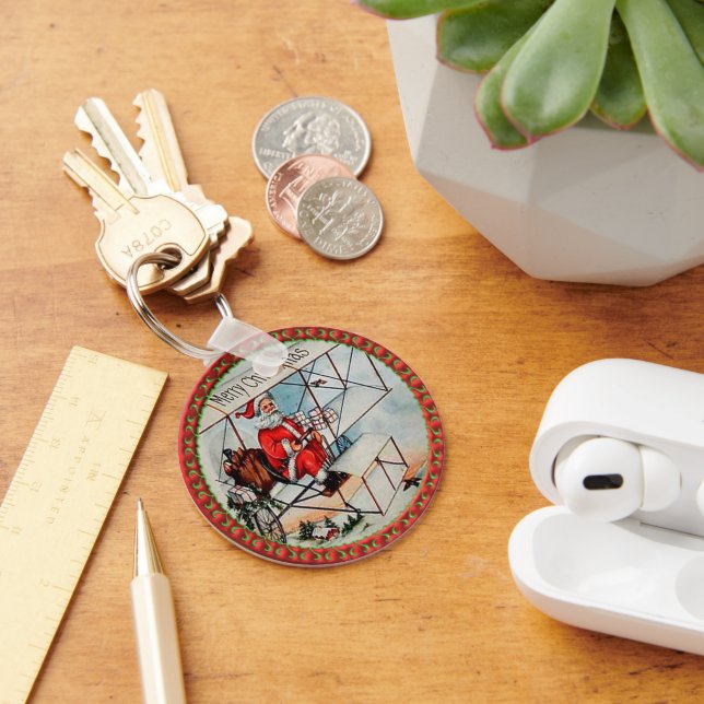 Christmas Santa flying a old airplane Keychain (Desk)