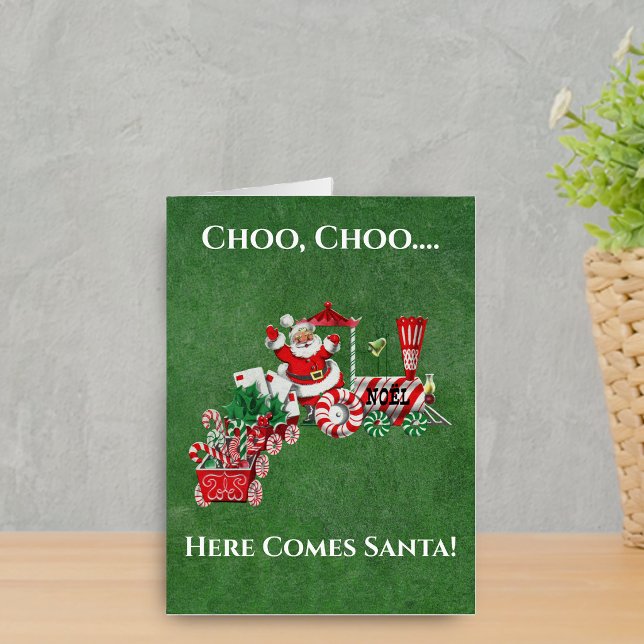 Christmas Santa Riding Peppermint Candy Train Card (Santa riding Christmas train candy canes letters on oversized green Merry christmas greeting card.)