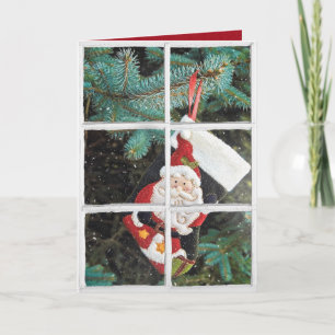 Christmas Santa stocking in snowy window Holiday Card