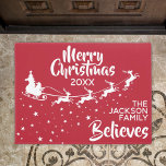 Christmas Santa's sleigh reindeers holiday Doormat<br><div class="desc">Show how much you believe in the magic of Christmas and Santa Claus with this Christmas doormat featuring the silhouette of Santa's sleigh in white with his reindeers, flying in a trail of stars. The caption on top reads Merry Christmas in white handwritten lettering. The text is easily customizable with...</div>