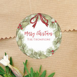Christmas Simple Red Holly Berries Pine Wreath  Classic Round Sticker<br><div class="desc">This design features Christmas holiday red holly berries, botanical greenery pine leaves branch botanical wreath with winter forest pine branches twigs, simple minimalist family name custom, modern elegant rustic winter woods, Christmas holiday gift favor label, Christmas holiday treat sticker, modern brush script pine tree, rustic country typography text, Christmas holiday...</div>