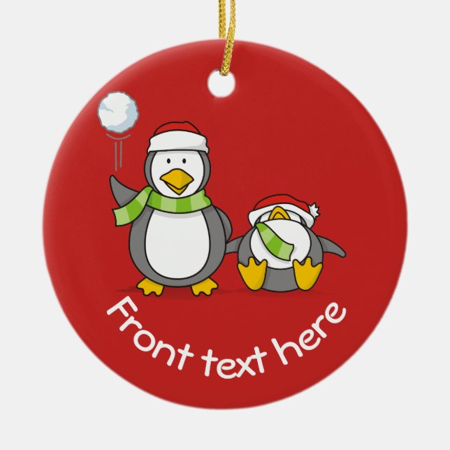 Christmas Snowballing penguins Ceramic Ornament (Front)