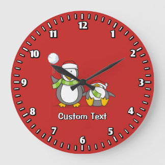Christmas Snowballing penguins Large Clock