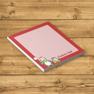 Christmas Snowballing penguins Notepad