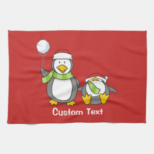 Christmas Snowballing penguins Towel