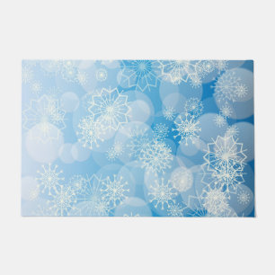 Christmas snowflakes on a blue background doormat