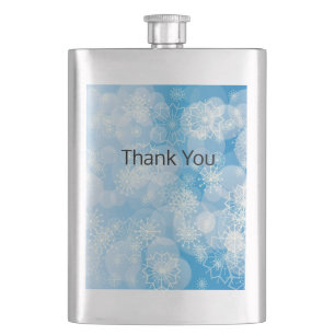 Christmas snowflakes on a blue background       flask
