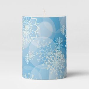 Christmas snowflakes on a blue background pillar candle