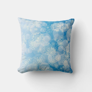 Christmas snowflakes on a blue background          throw pillow