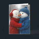 Christmas Snowman Couple in Snowflakes Card<br><div class="desc">A snowwoman and a snowman,  dressed in colorful winter attire,  share a warm hug in a snowy forest  
All text can be changed.</div>