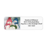 CHRISTMAS SNOWMAN FAMILY LABEL<br><div class="desc">Oh so sweet Snowmen Family of 3 celebrating and wishing you a merry holiday season.  Mom's wearing a red knitted hat and scarf,  Dad is wearing a blue knitted hat and scarf and junior is wearing a green scarf .. all have matching buttons and have a beautiful seasonal smile!</div>