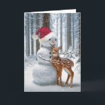 Christmas Snowman Hugging a Fawn Holiday Card<br><div class="desc">A whimsical scene in a snow-covered forest features a friendly snowman with a carrot nose and Santa Claus hat,  with a young deer nuzzling against it.
All inside text can be changed.</div>