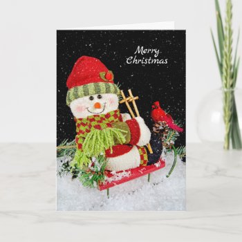 Christmas Snowman On Sled Holiday Card by dryfhout at Zazzle
