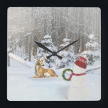 Christmas snowman with deer in winter woods square wall clock<br><div class="desc">snowman with Christmas wreath in winter woods with deer in snow</div>