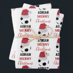 Christmas Soccer Ball Sports Football Custom Name Wrapping Paper Sheets<br><div class="desc">A cute illustration of soccer ball wearing a Santa hat with words "Merry Christmas" and your custom name. Perfect for adults and kids who love playing football. An ideal soccer themed Christmas wrapping paper for soccer players, soccer coaches, soccer teams, athletes and soccer enthusiasts. Simply customize the name and make...</div>