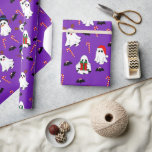 Christmas spirits wrapping paper<br><div class="desc">The ghost want to show Christmas spirit.  Here is a wrapping paper with a snowman ghost,  reindeer ghost,  ghost with a hat,  and ghost with a present. Put this fun silly wrapping paper under a tree or a present display for a picture to remember.</div>