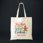 Christmas Teacher Personalized Gift Tote Bag<br><div class="desc">This cute teacher tote bag makes for a great Christmas gift! Combining script typography with a cute cookie and candy canes this tote bag is sure to bring holiday cheer. ©TeacherTribeMerch</div>