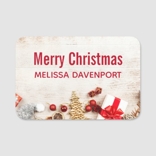 Christmas Themed Items on a Rustic Wooden Board Name Tag