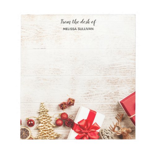 Christmas Themed Items on a Rustic Wooden Board Notepad