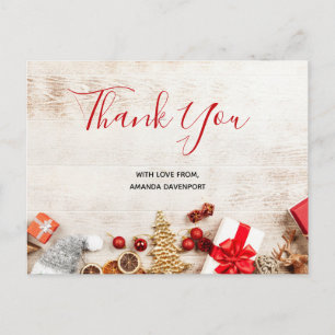 Christmas Themed Items on a Rustic Wooden Board Postcard