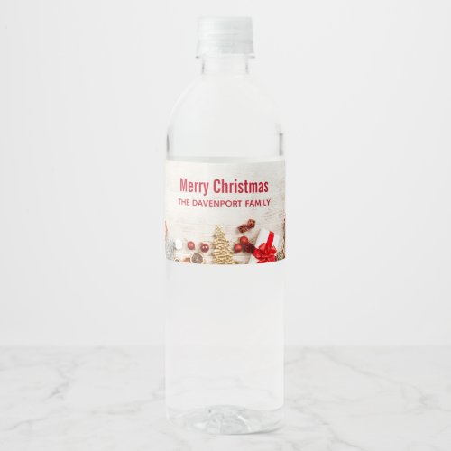 Christmas Themed Items on a Rustic Wooden Board Water Bottle Label