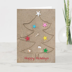 Christmas tree drawing in beach sand card