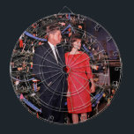 Christmas Tree President John Kennedy & Jacqueline Dart Board<br><div class="desc">The year was 1962. President John F. Kennedy and First Lady Jacqueline Kennedy were at the height of their popularity, and the White House was abuzz with excitement as the holiday season approached. The First Lady, known for her impeccable taste and attention to detail, had meticulously planned the White House...</div>