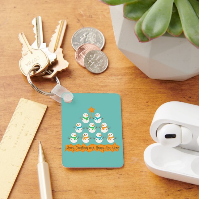 Christmas tree pyramid made of xmas snowmen keychain (Desk)