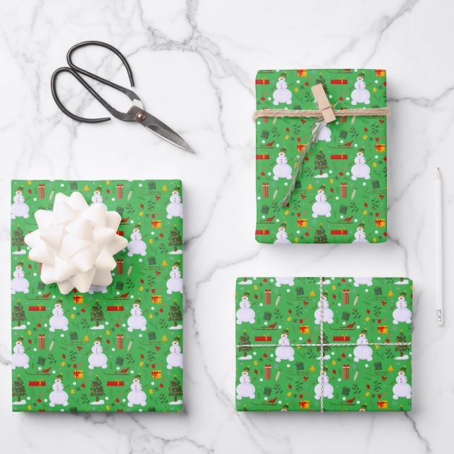 Christmas Tree Snowman Sled Gifts Bells Wrapping Paper Sheets (Front)