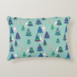 Christmas trees on a blue background accent pillow